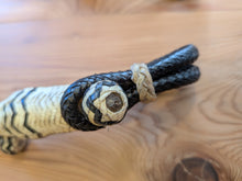 Load image into Gallery viewer, 28 Plait Bosal Hanger Rawhide Black with Natural Buttons and black accents