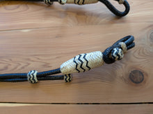 Load image into Gallery viewer, 28 Plait Bosal Hanger Rawhide Black with Natural Buttons and black accents